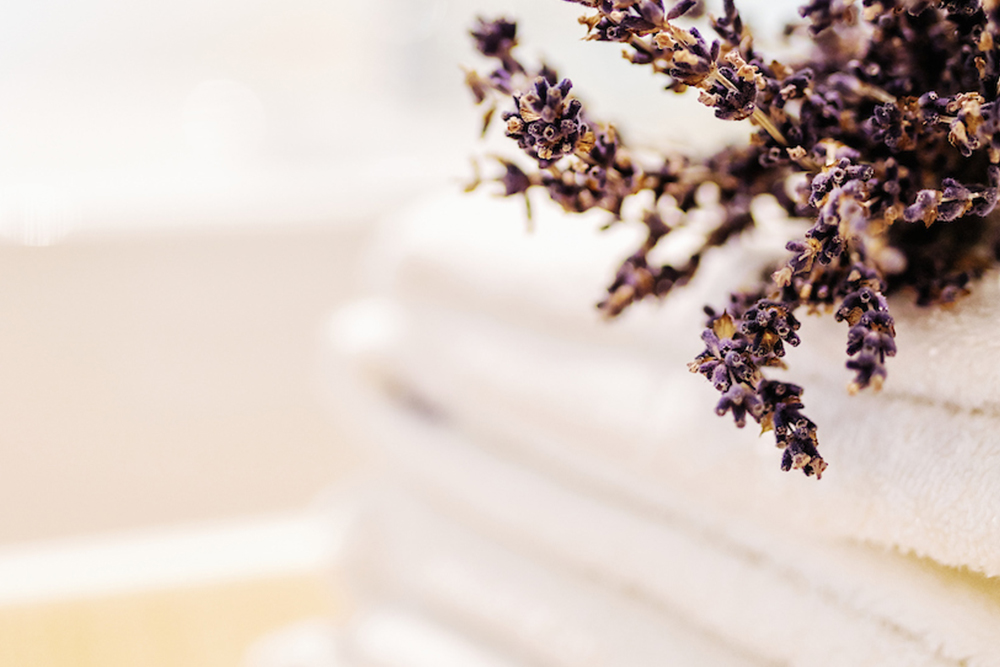 Lavender and soft towels for a relaxing wellness atmosphere