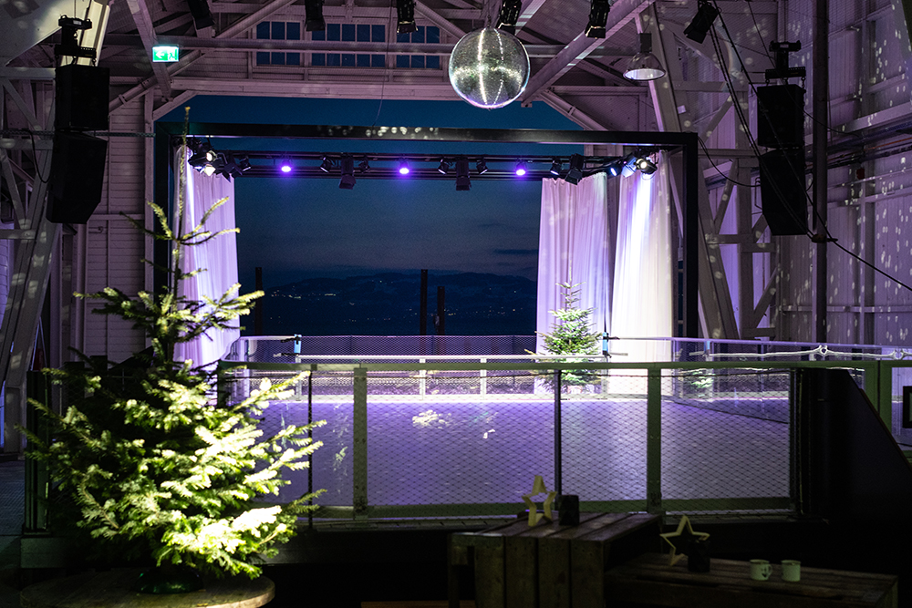 Festively illuminated event location for winter events on Lake Constance